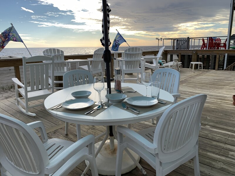 Outdoor dining setup on the deck