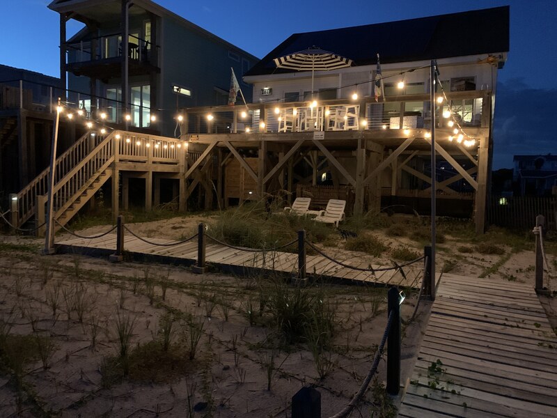 Entry stairs and exterior at dusk
