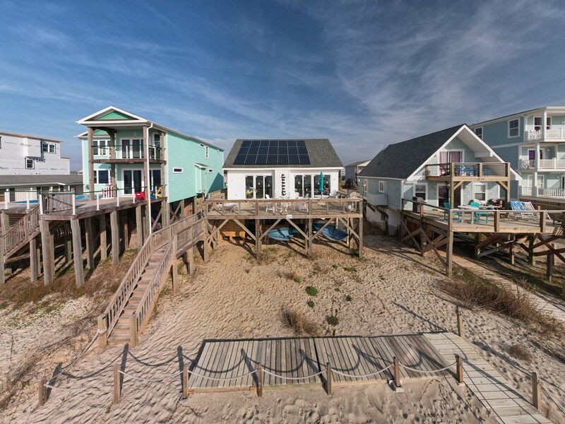 Second aerial context view of the home and surrounding coast