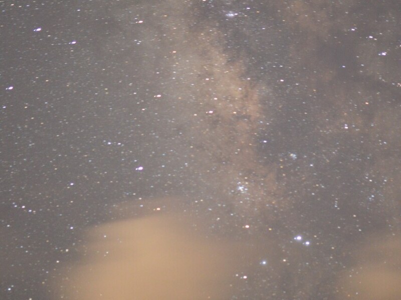 Star-filled coastal sky at night