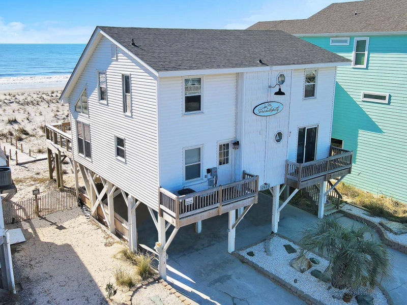 Front-left exterior view of the Oak Island beach house