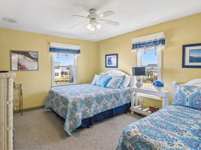 Upper-level guest room with sunset tones